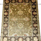 Siyani Brown And Golden Floral Textured Hand Knotted Carpet