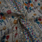 Siyani White Rajasthani Foil Print Rayon Fabric