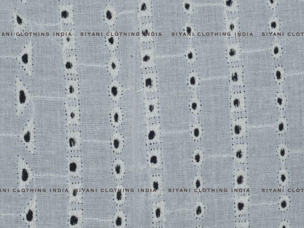 Siyani Kora Cotton Dyeable Cutwork Holes And Triangle Chikankari Embroidered Fabric