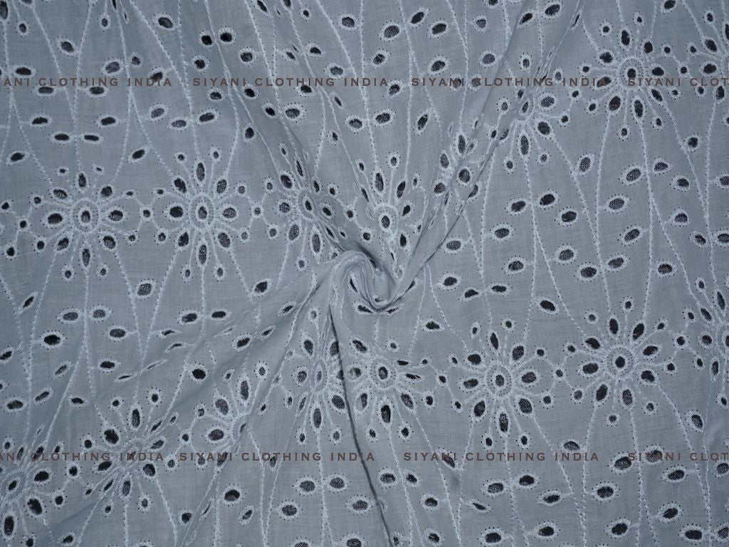 Siyani White Dyeable Floral Abstract Cotton Schiffli Embroidered Fabric