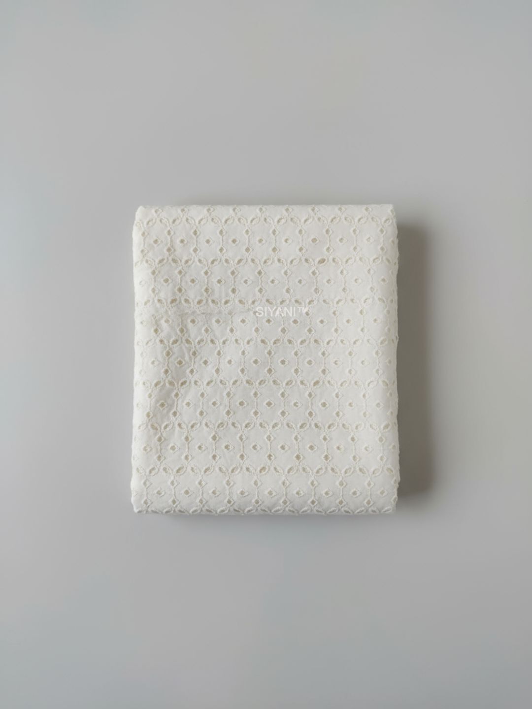 Kora cut work embroidered fabric