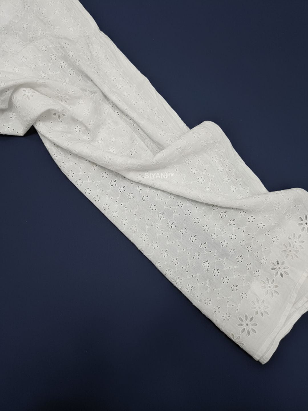 Mini Floral Eyelet Schiffli Embroidered fabric