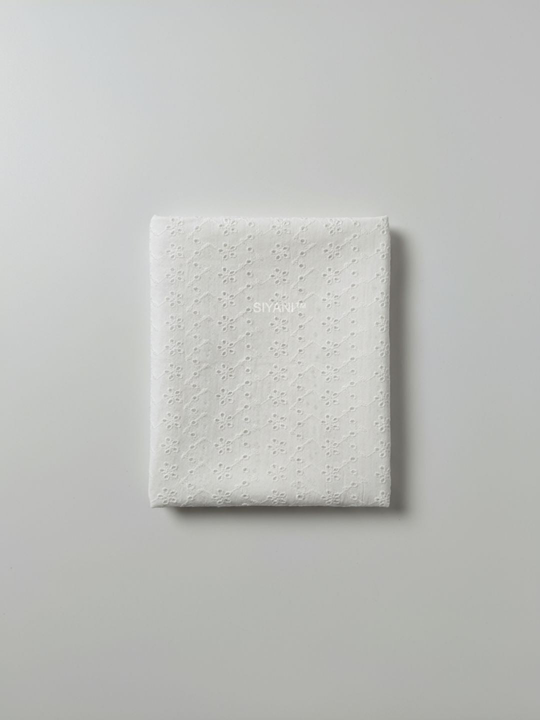 Mini Floral Eyelet Schiffli Embroidered fabric