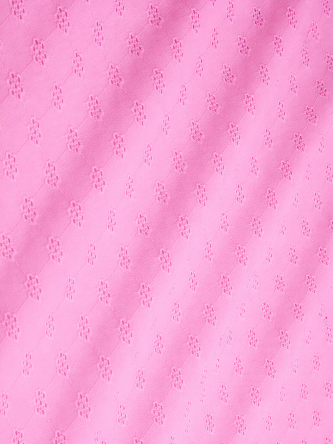 Powder pink floral schiffli embroidered fabric
