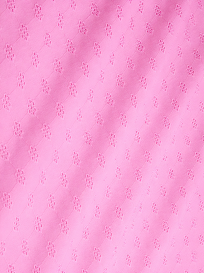 Powder pink floral schiffli embroidered fabric