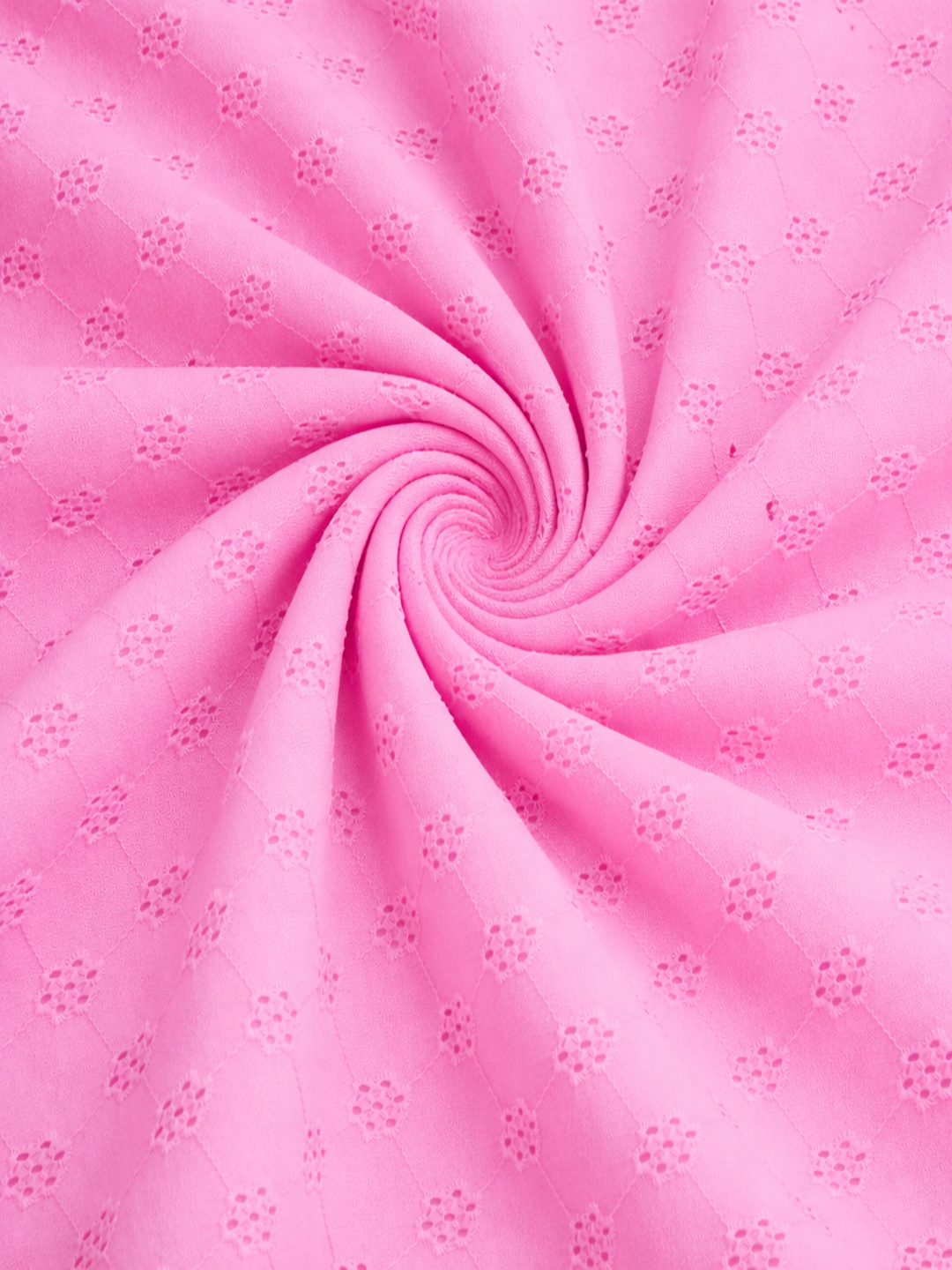 Powder pink floral schiffli embroidered fabric