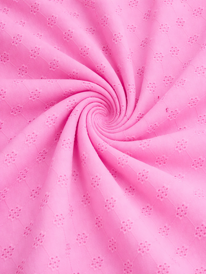 Powder pink floral schiffli embroidered fabric