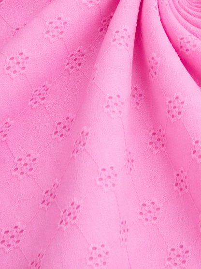Powder pink floral schiffli embroidered fabric