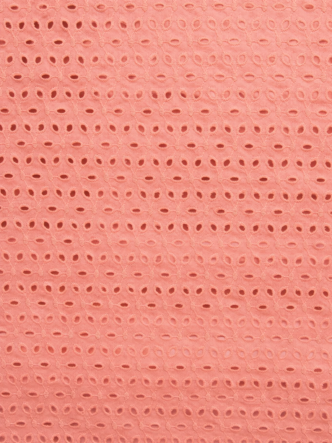 Coral pink six hole schiffli embroidered fabric