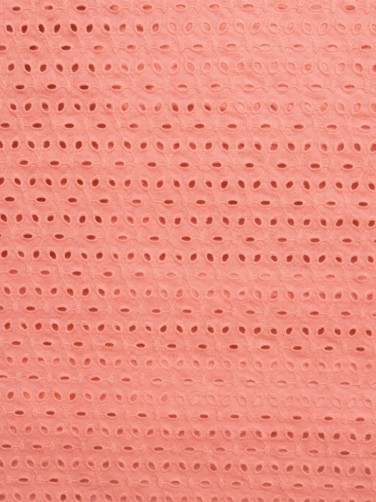 Coral pink six hole schiffli embroidered fabric