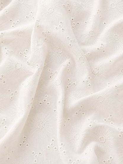 Off White Floral Eyelet Schiffli fabric