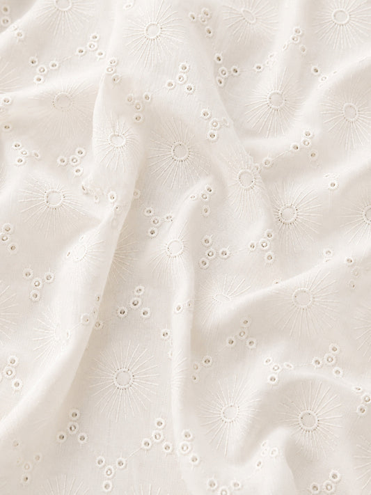 Off White Floral Eyelet Schiffli fabric