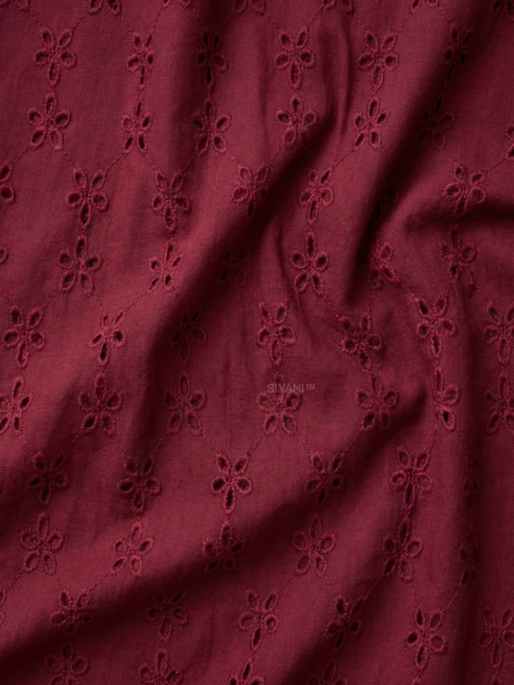 Maroon five hole pentagon schiffli fabric