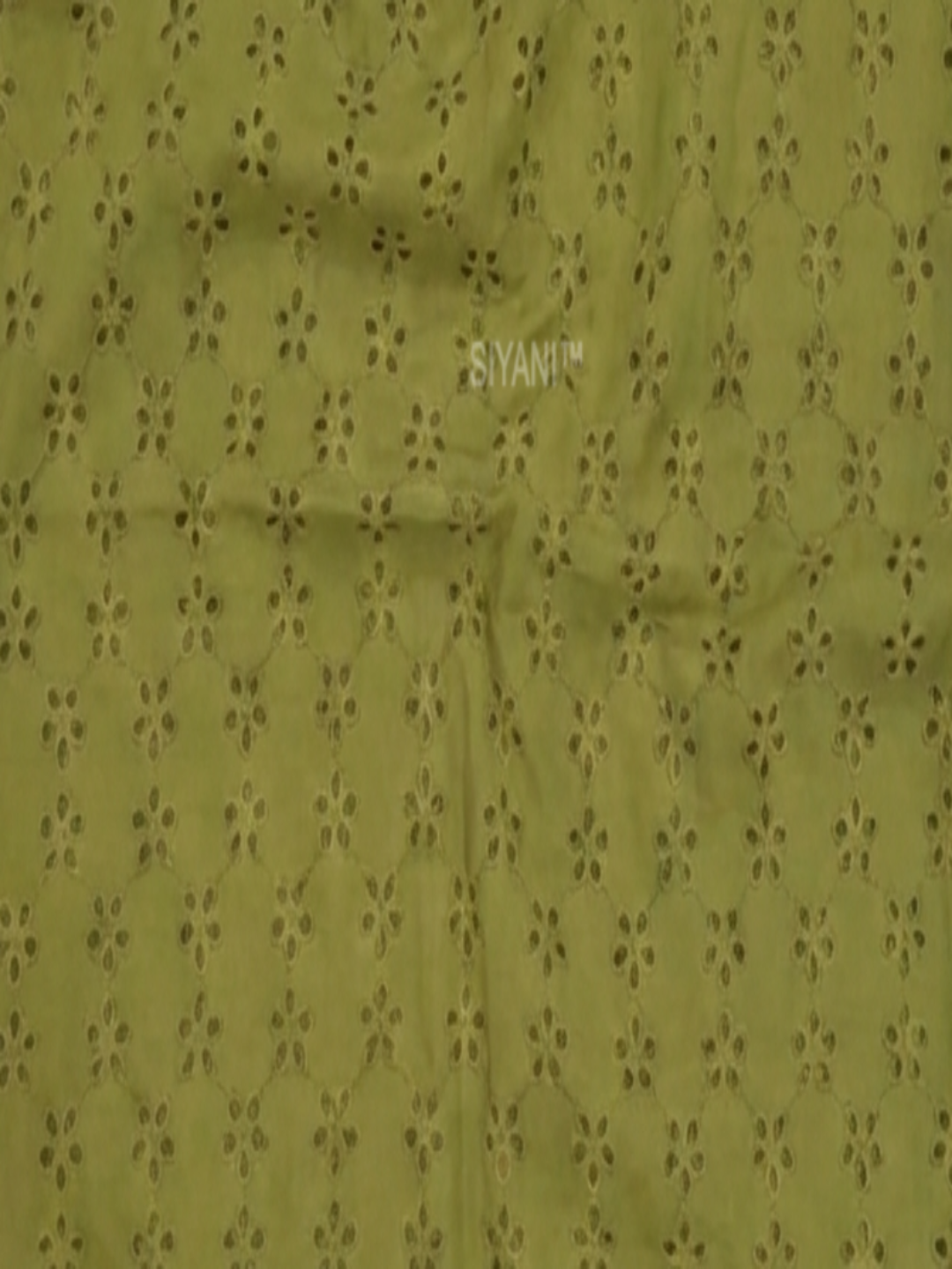 Olive green five hole pentagon schiffli fabric