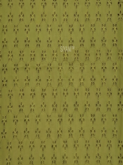Olive green five hole pentagon schiffli fabric