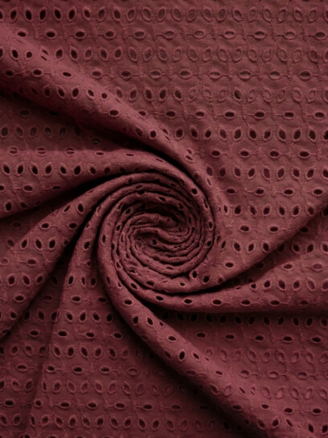 Maroon six hole schiffli embroidered fabric