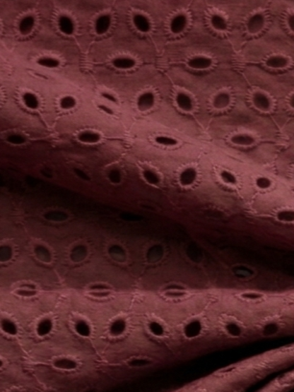 Maroon six hole schiffli embroidered fabric