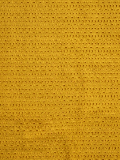 Mustard six hole schiffli embroidered fabric