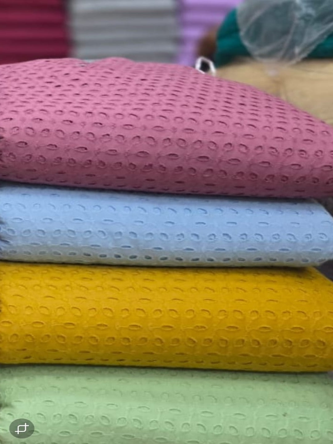 Pastel blue six hole schiffli embroidered fabric