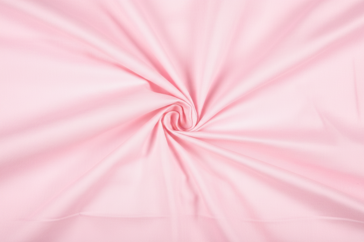 Close-up macro shot of Baby Pink Cotton Poplin Lycra Fabric showing fine rib texture and smooth weave