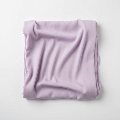 Pastel violet Jam Cotton fabric flat lay on white background