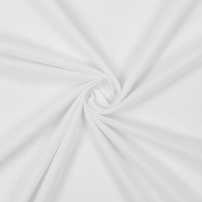 White cotton voile fabric in multiple soft overlapping layered folds showing sheer translucency and depth