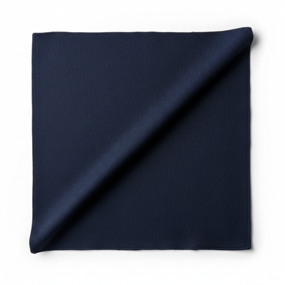 Navy blue rayon slub lycra fabric diagonal fold hero shot showing drape and stretch