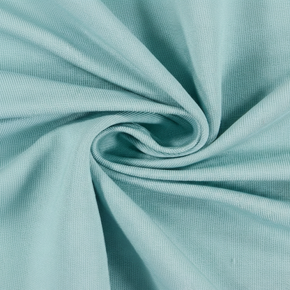Extreme macro close-up of sky blue jam cotton fabric showing ribbed twill weave structure and thread detail