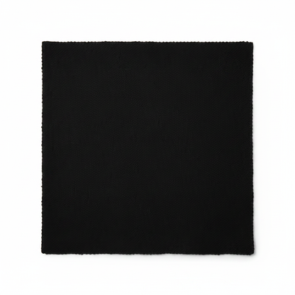 Black jam cotton fabric laid completely flat showing full piece and ribbed twill texture