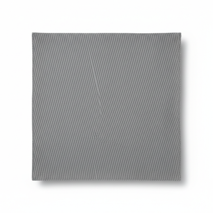 Grey jam cotton fabric laid completely flat showing full piece and ribbed twill texture