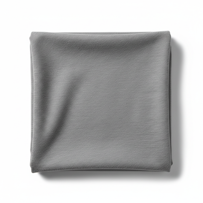 Grey jam cotton fabric in elegant diagonal twill fold hero shot showing natural drape