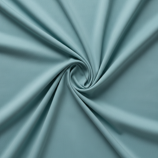 Sky blue jam cotton fabric in elegant diagonal twill fold hero shot showing natural drape