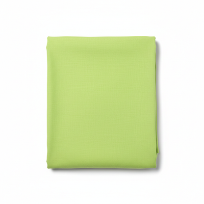 Lime green Jam Cotton fabric flat lay on white background