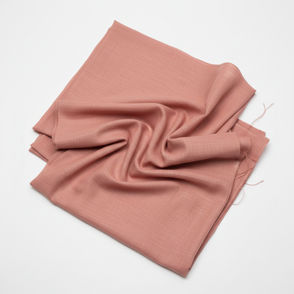 Rust pink Jam Cotton fabric flat lay on white background