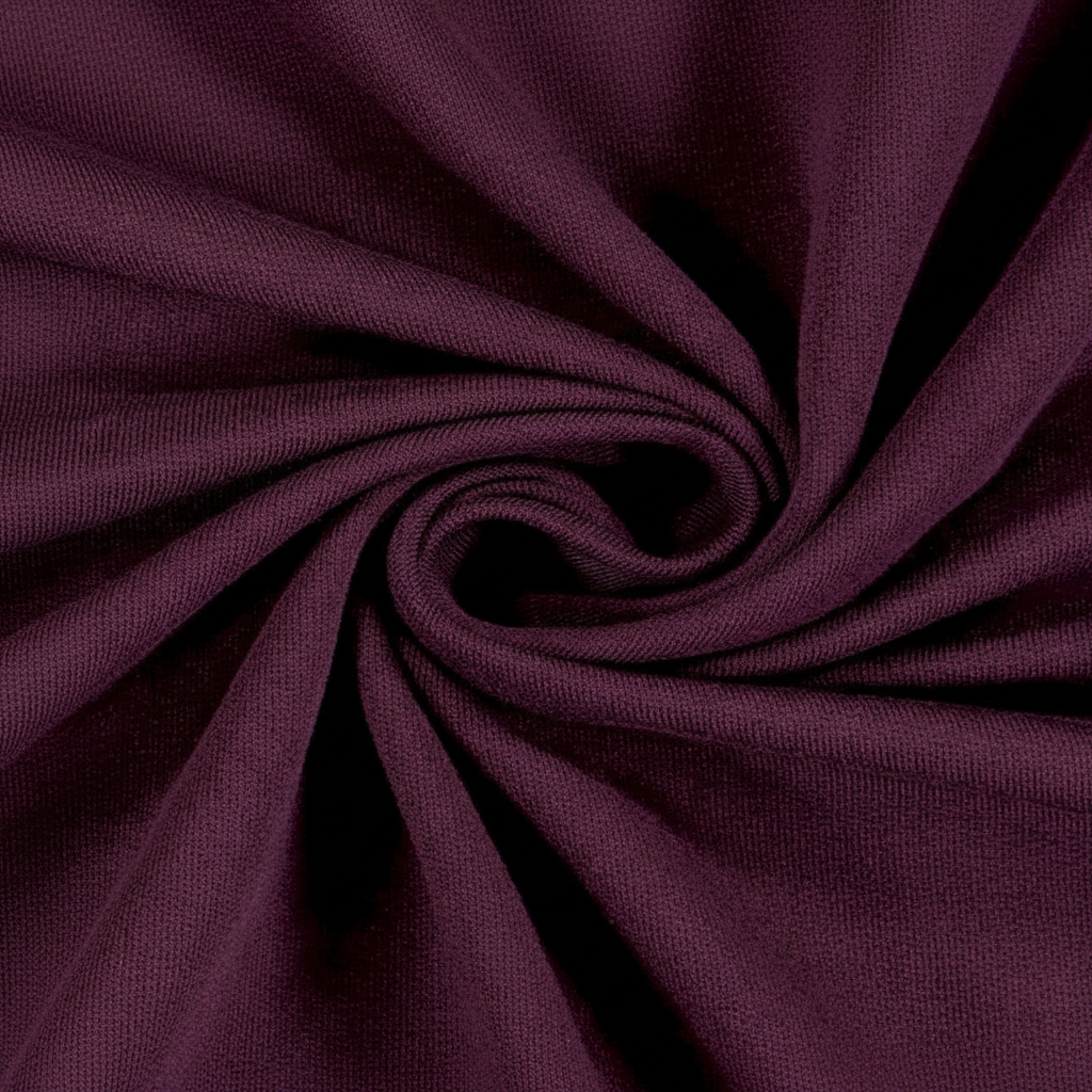 Extreme macro close-up of wine jam cotton fabric showing ribbed twill weave structure and thread detail