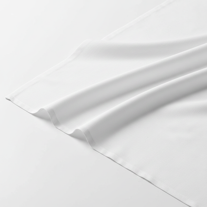 White cotton blend fabric at 45-degree angle showing drape and woven surface texture