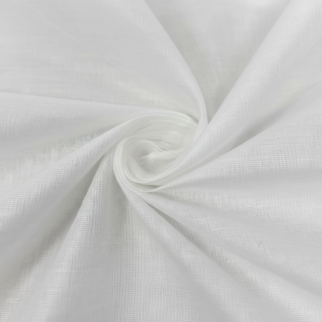Extreme macro close-up of white cotton voile fabric showing delicate open sheer weave structure and fine thread detail