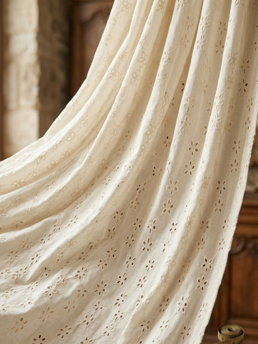 Off White five hole pentagon schiffli fabric