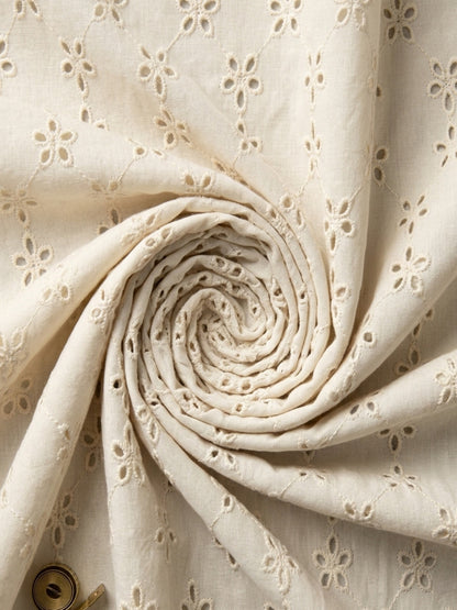 Off White five hole pentagon schiffli fabric
