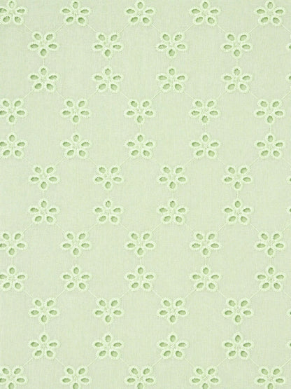 Lime green five hole pentagon schiffli fabric