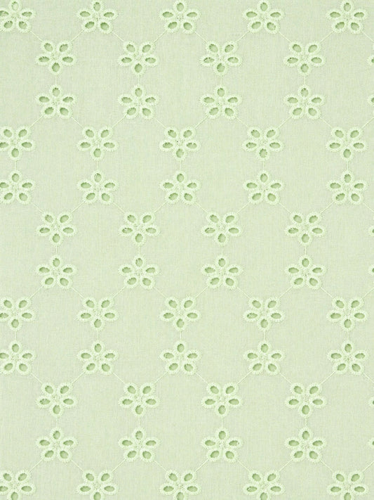 Lime green five hole pentagon schiffli fabric