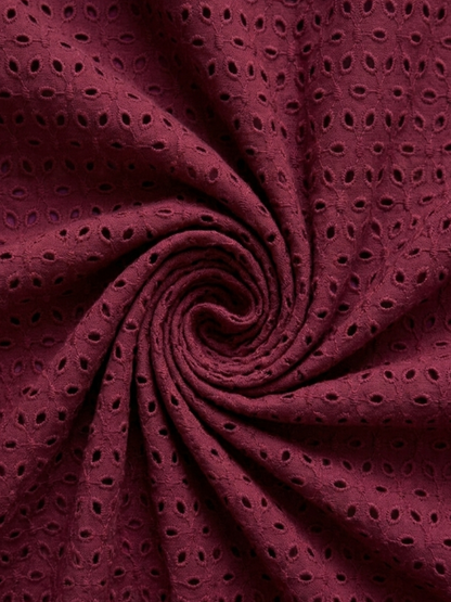 Maroon six hole schiffli embroidered fabric