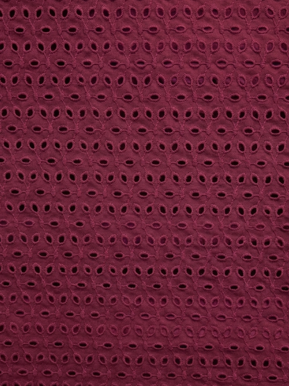 Maroon six hole schiffli embroidered fabric