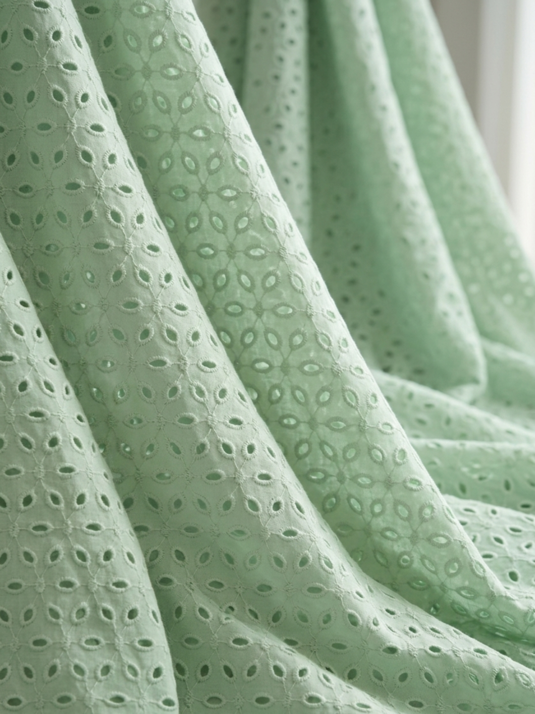 Mint Green six hole schiffli embroidered fabric