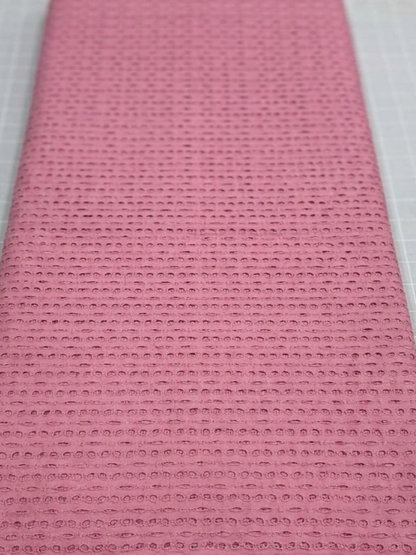 Pink six hole schiffli embroidered fabric