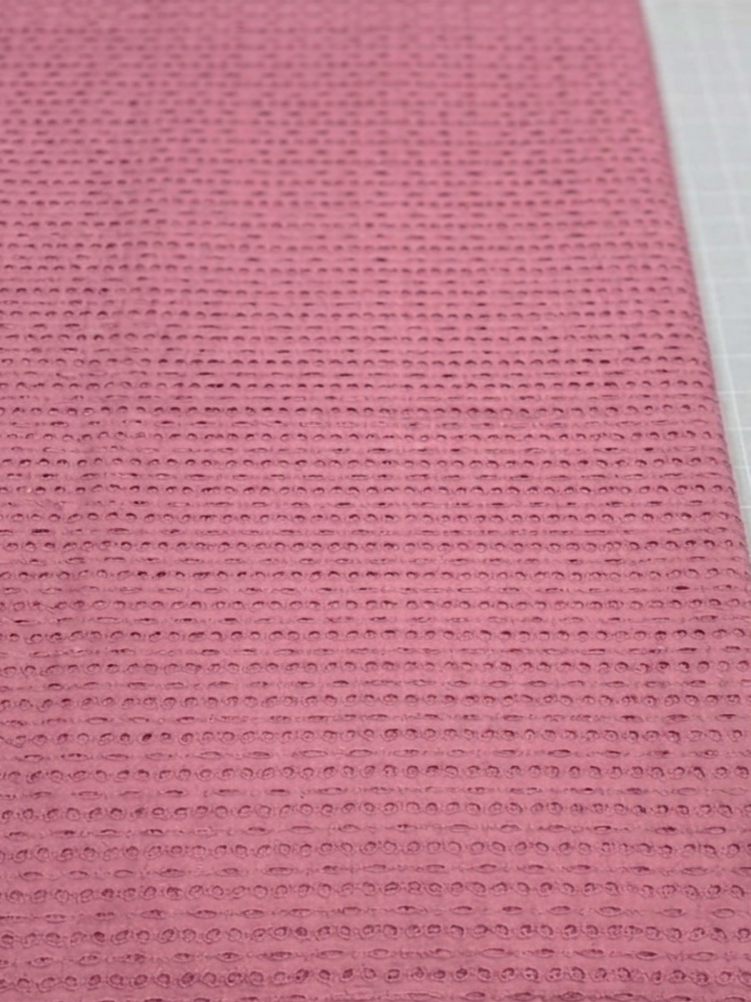 Pink six hole schiffli embroidered fabric
