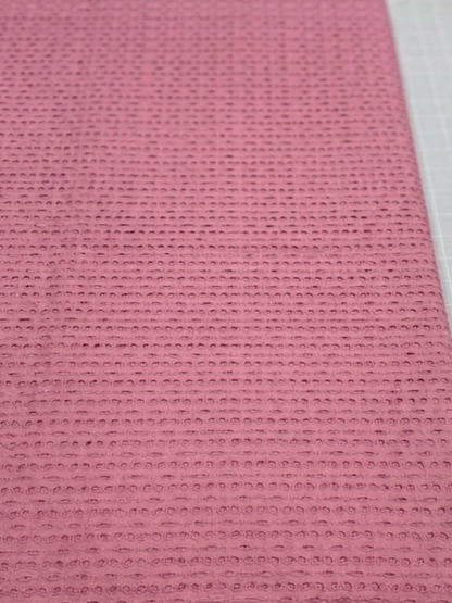 Pink six hole schiffli embroidered fabric