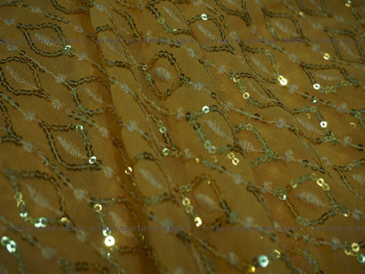 Yellow Abstract Sequins And Thread Embroidered Georgette Fabric