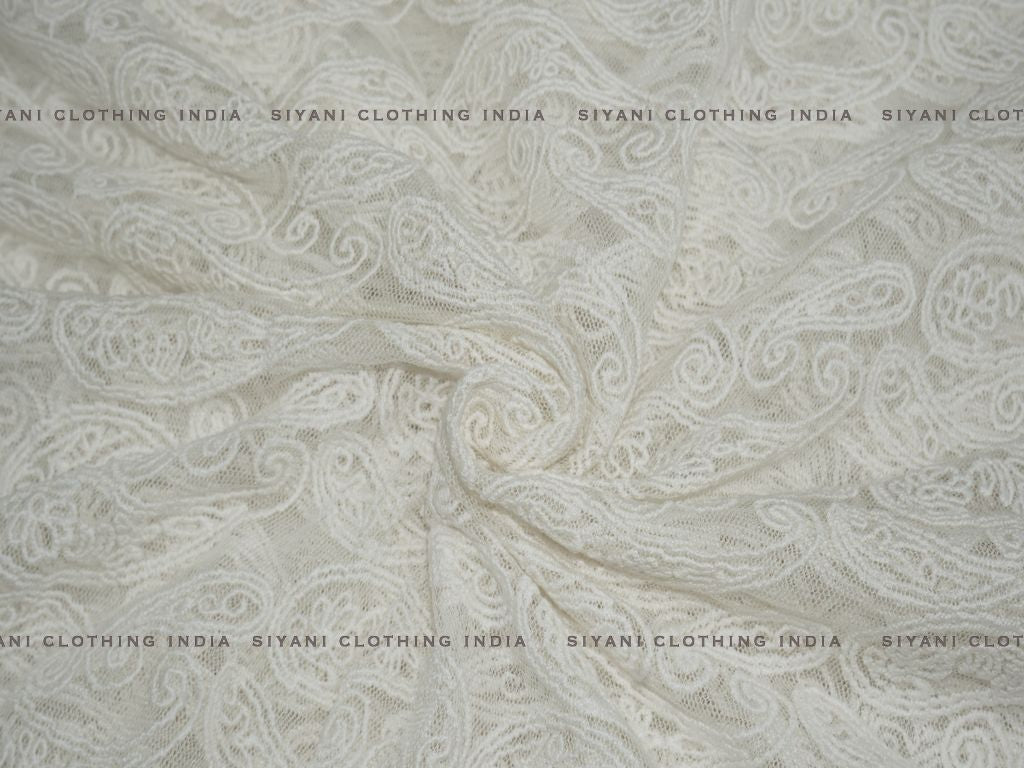Siyani Off White Dyeable Kalash Embroidered Net Fabric