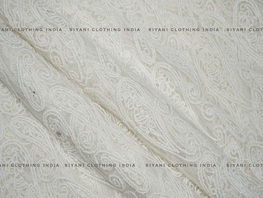 Off White Dyeable Kalash Embroidered Net Fabric - Siyani Clothing India